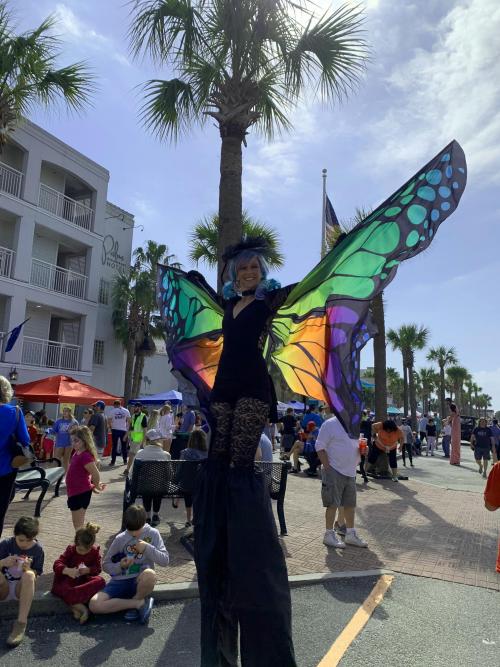Front Beach Fest stiltwalking butterfly Front Beach Fest