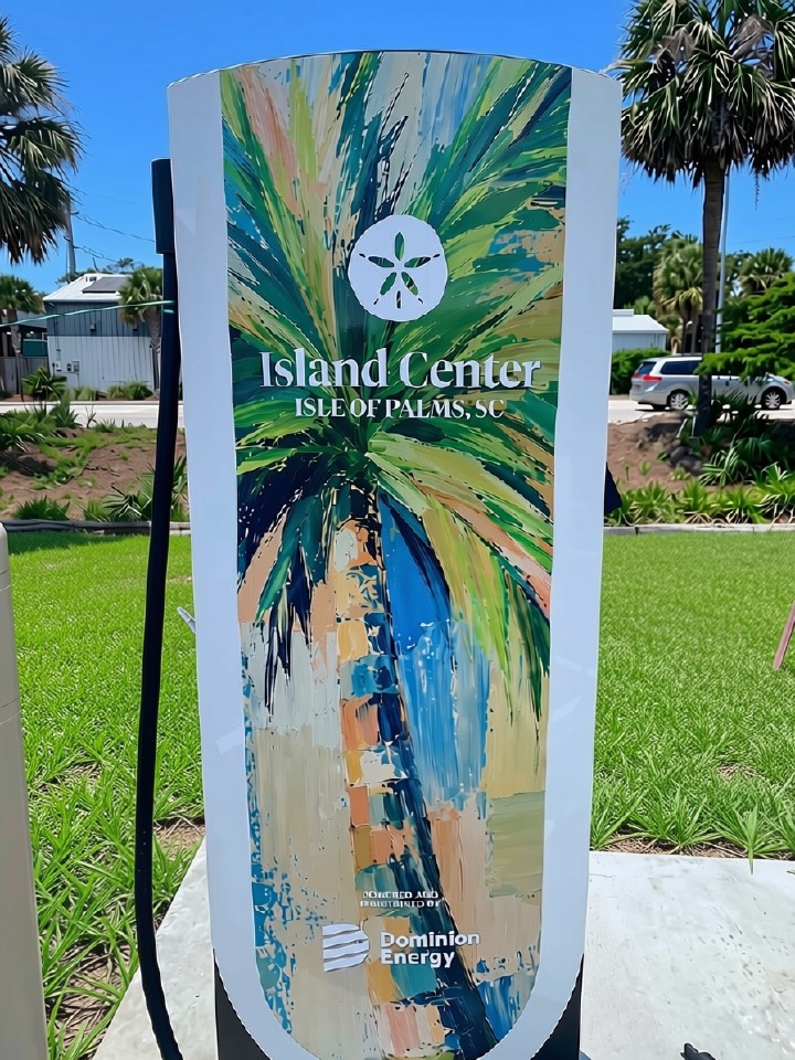 new Supercharger station wrapped in IOP artwork, palm new Supercharger station near EP's IOP vacation rentals