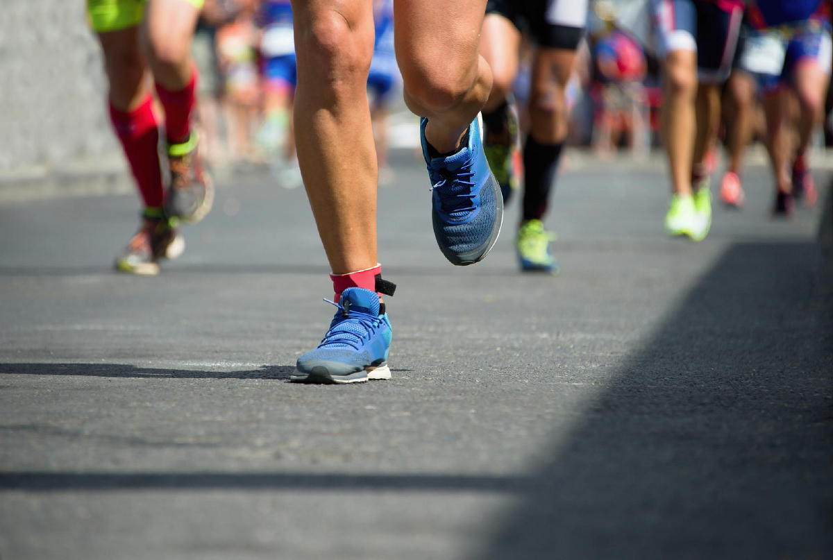 Bridge Run runners on pavement 10K